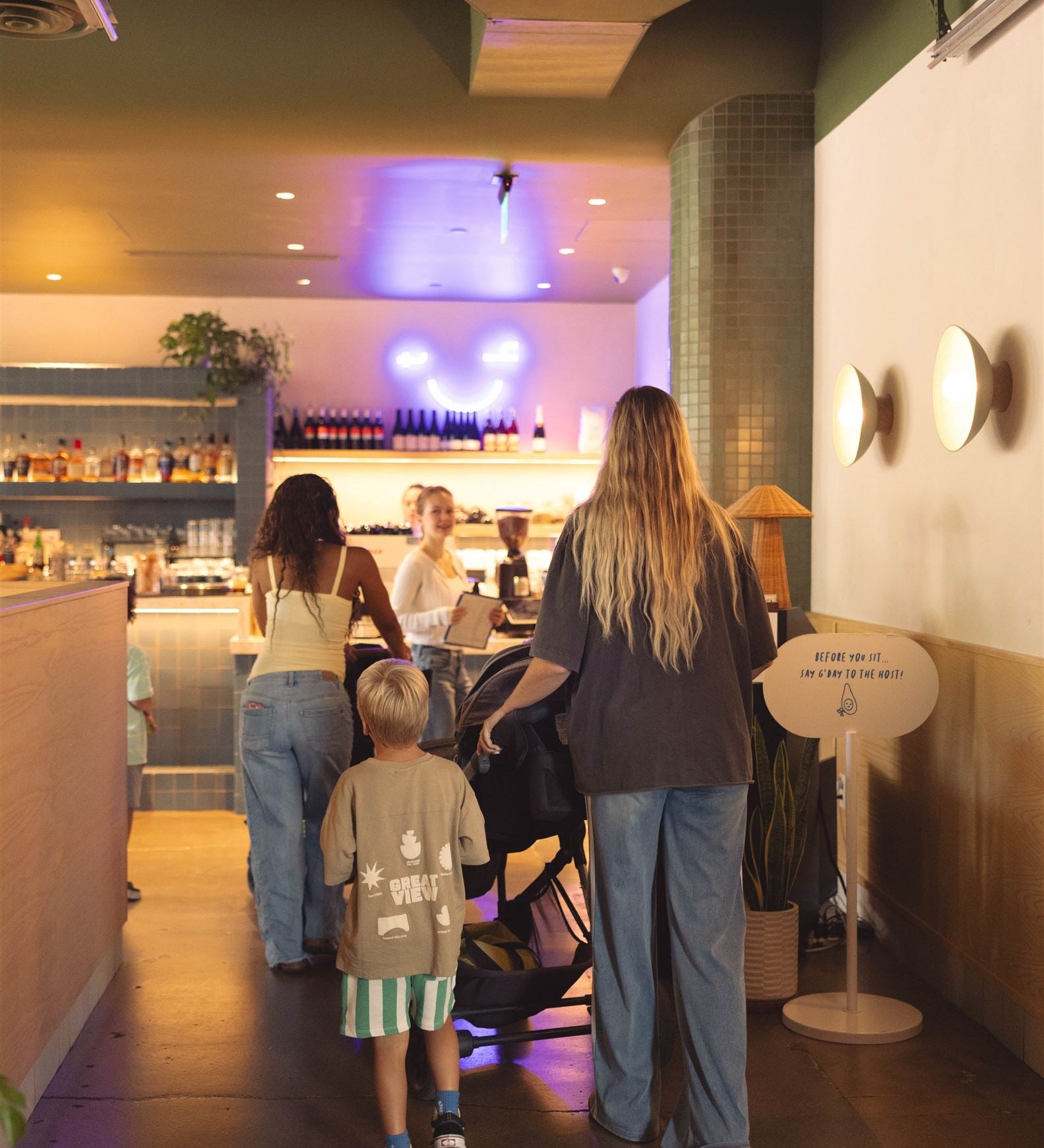 Mom leaving house with baby