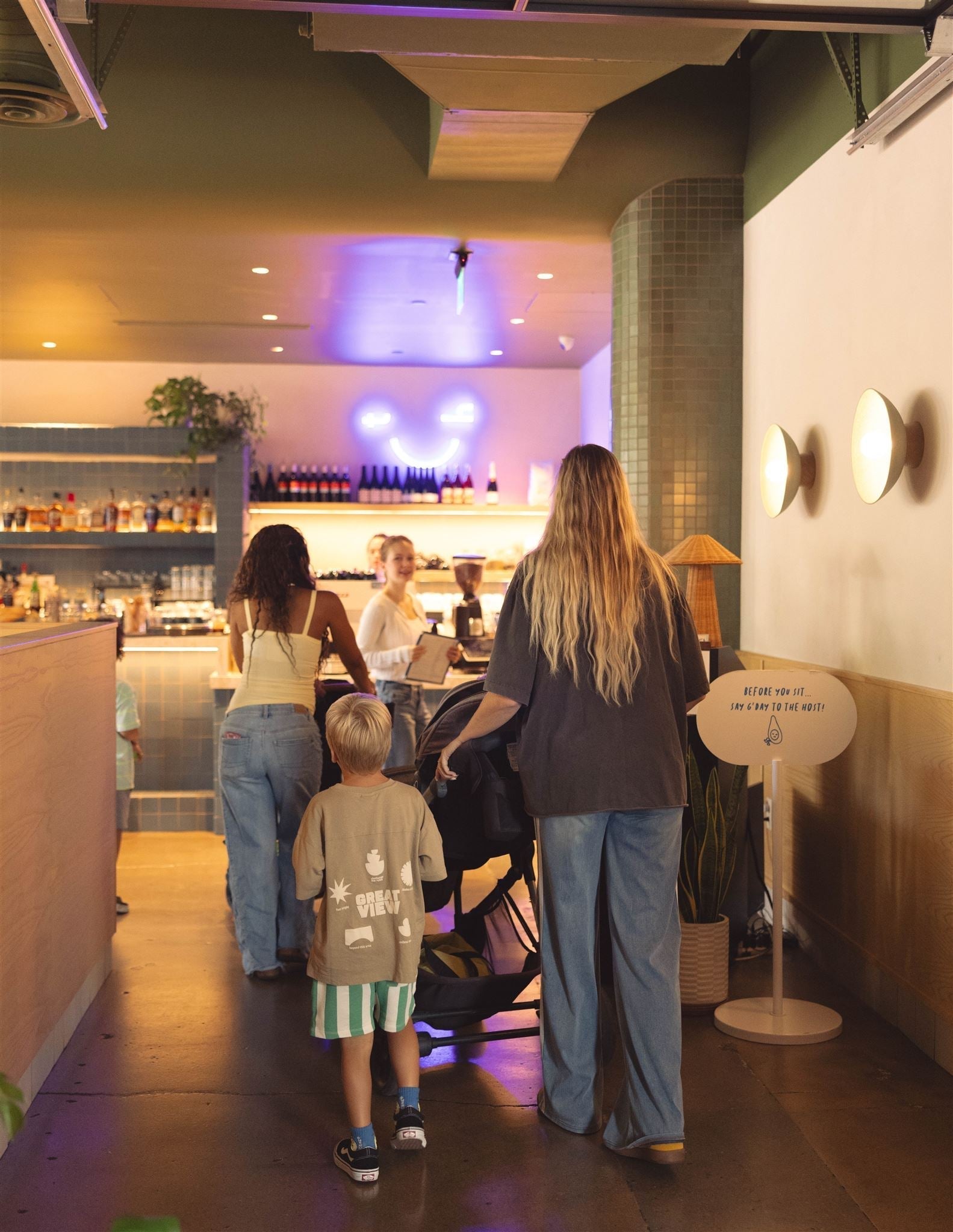 Mom leaving house with baby
